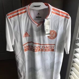 Atlanta United king peach authentic jersey.